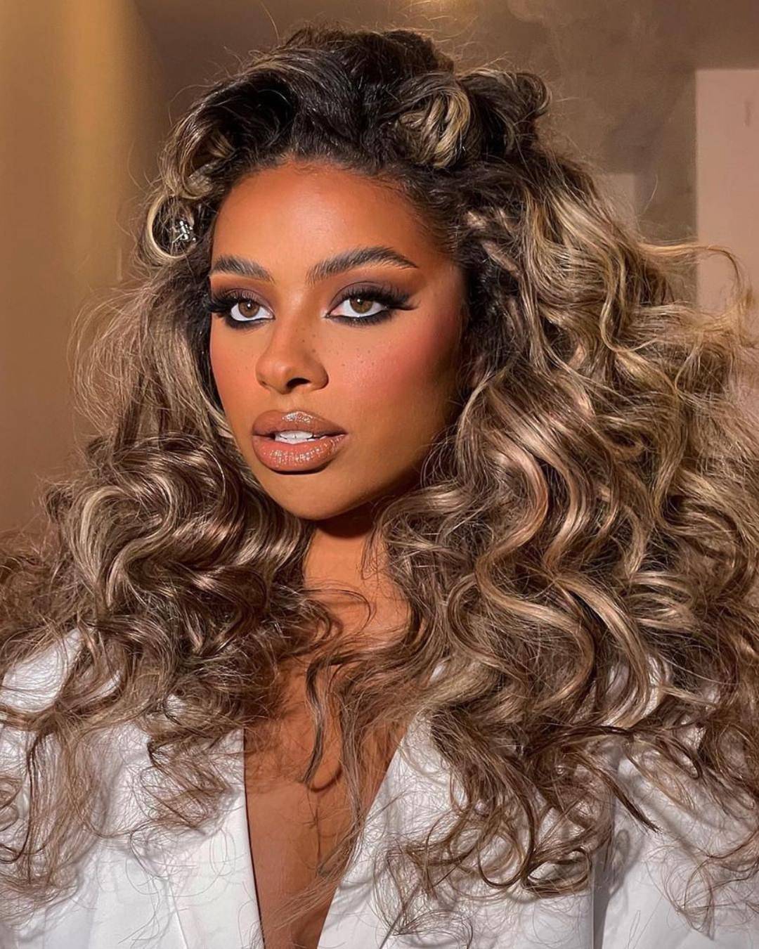 Foiled blend of Ash & Blonde | Bronze Bliss Clip In Hair Extensions | Kiki Hair Extensions