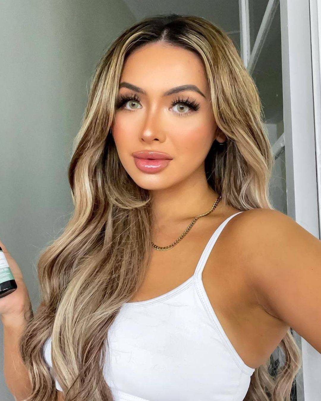 Foiled blend of Ash & Blonde | Bronze Bliss Clip In Hair Extensions | Kiki Hair Extensions